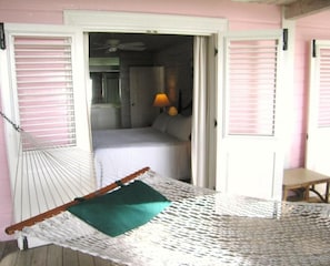 Relax in comfort with a hammock bed and convenient amenities.