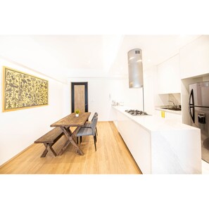 Deluxe Apartment | Living area | TV