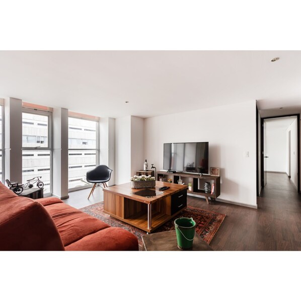 Departamento Deluxe | Sala de estar | Televisión 