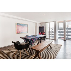 Deluxe Apartment | Living area | TV