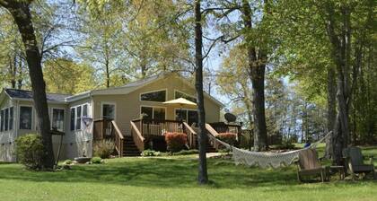 GO JUMP IN THE LAKE at this lovely waterfront home!