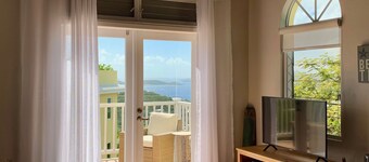 Newly Renovated 2-Bedroom Condo with Sunset View & Power Generator
