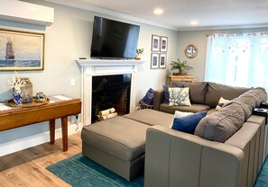 Smart TV, fireplace, video games, DVD player