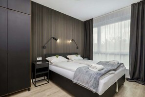 1 slaapkamer, een strijkplank/strijkijzer, reisbedje, wifi