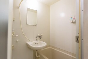 Separate tub and shower, free toiletries, hair dryer, towels