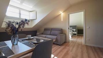 Exclusieve penthouse (4 Pax) | Woonkamer | Flatscreentelevisie