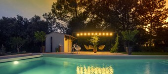 L'Atelier, with its century-old oak trees and panoramic view of the Luberon region