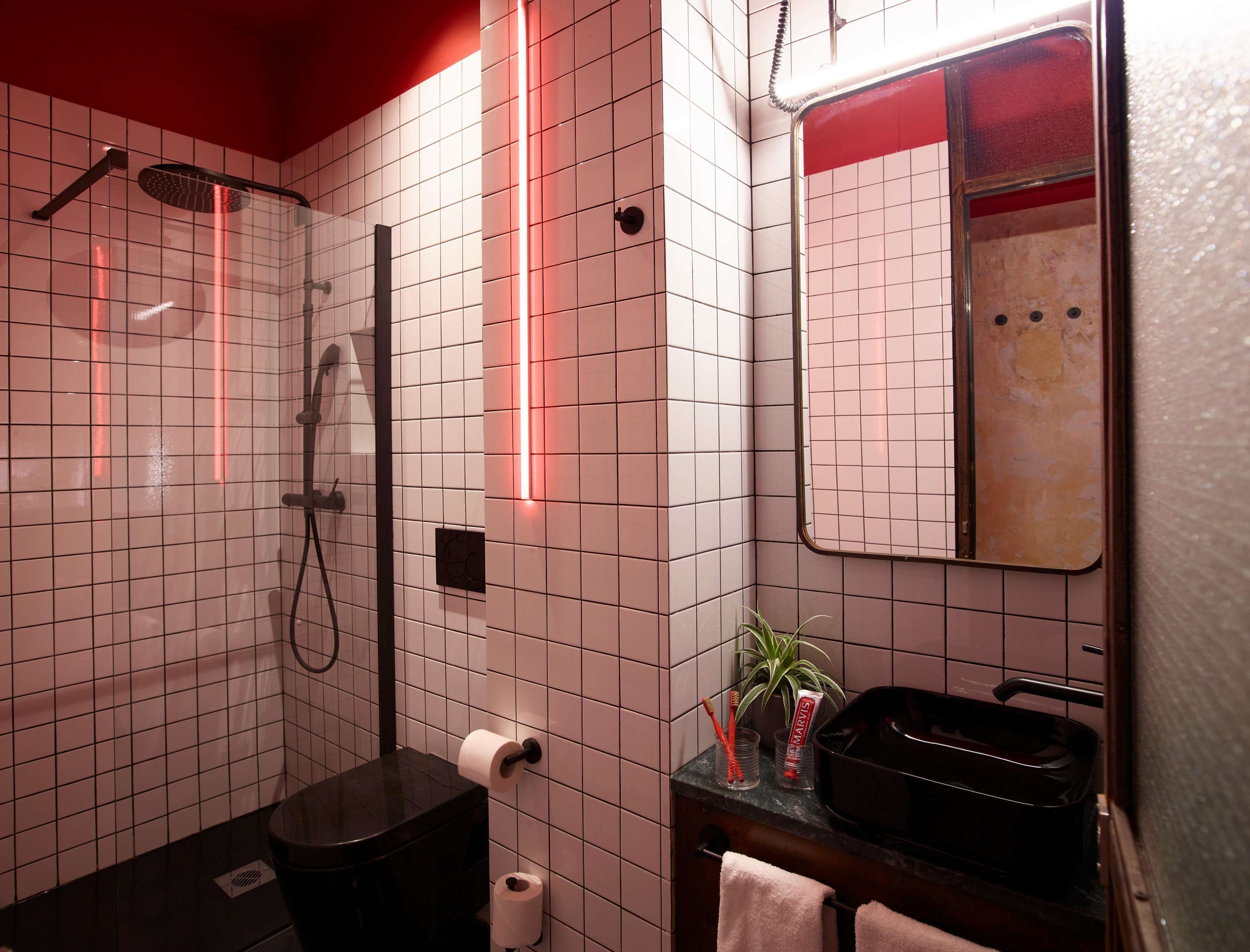 foxy plus king room | bathroom | shower, free toiletries, hair dryer, bathrobes