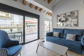 Premium Penthouse, 2 Bedrooms | Living area | 50-inch Smart TV with cable channels, TV - Arenal Suites Alicante (Alicante)