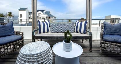 Modern Seafront Penthouse walking distance to shops and restaurants