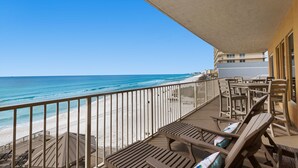 A balcony with a view of the beach and ocean. - Treasure Island 0412 (Panama City Beach)