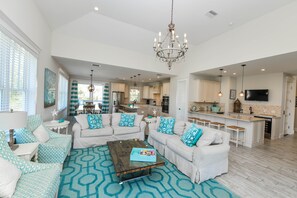 House, Multiple Beds, Private Pool | Living room | TV - Atlantis Beach House (Bradenton Beach)