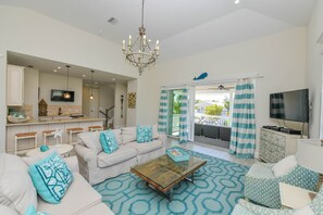 House, Multiple Beds, Private Pool | Living room | TV - Atlantis Beach House (Bradenton Beach)