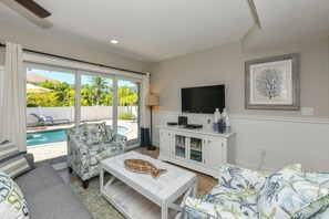 Cottage, Multiple Beds, Private Pool | Living room | TV - Sunrise Shore (Anna Maria)