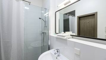 Shower, towels, soap, shampoo