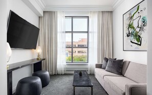 Room, 1 King Bed (Solarium) | Living area | 65-inch LED TV with cable channels, TV, Netflix