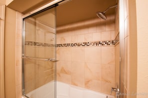 Hair dryer, towels, shampoo, toilet paper