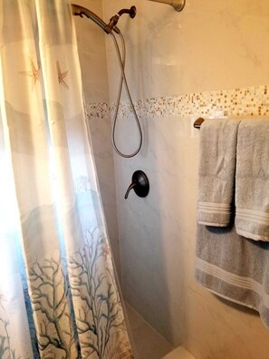 Hair dryer, towels, soap, shampoo