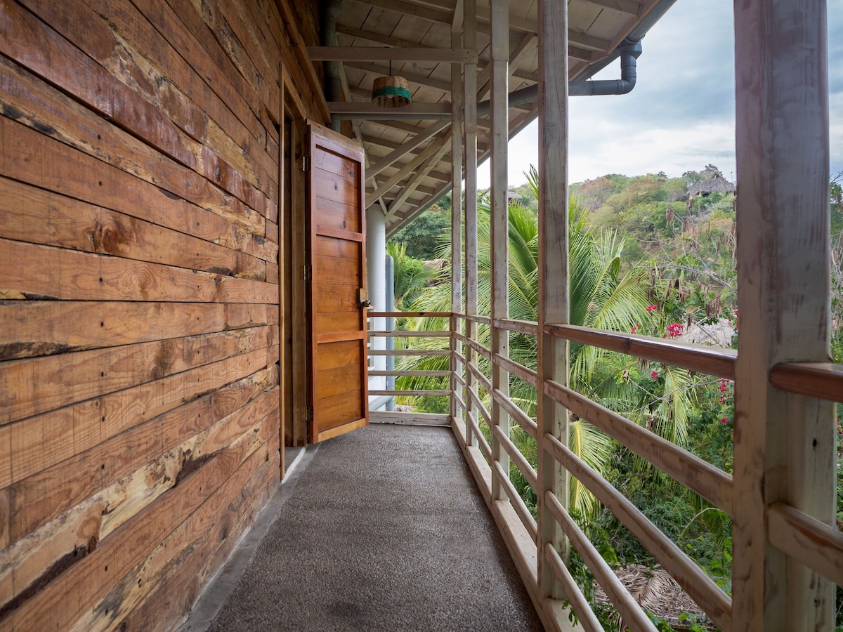 jungle view from the patio at at Posada del Arquitecto hotel in mazunte mexico