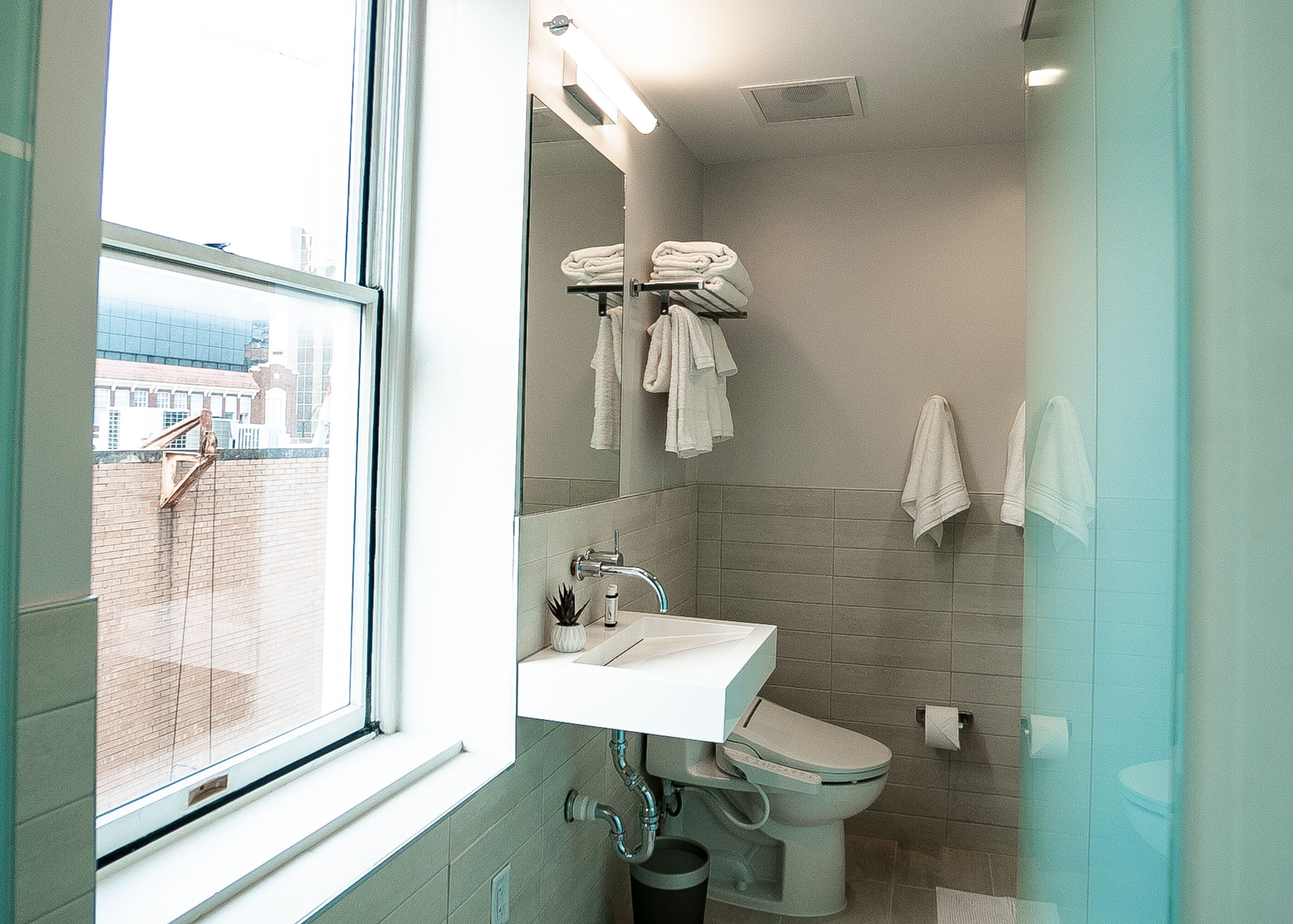 sova vip | bathroom | shower, rainfall showerhead, hair dryer, electronic bidet