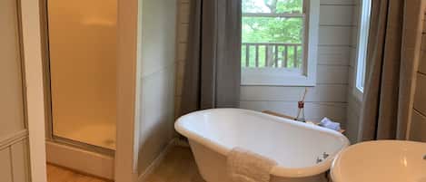 Bathtub, hair dryer, towels, soap