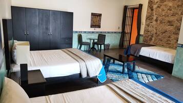 Family Room | Premium bedding, down duvets, individually furnished, iron/ironing board