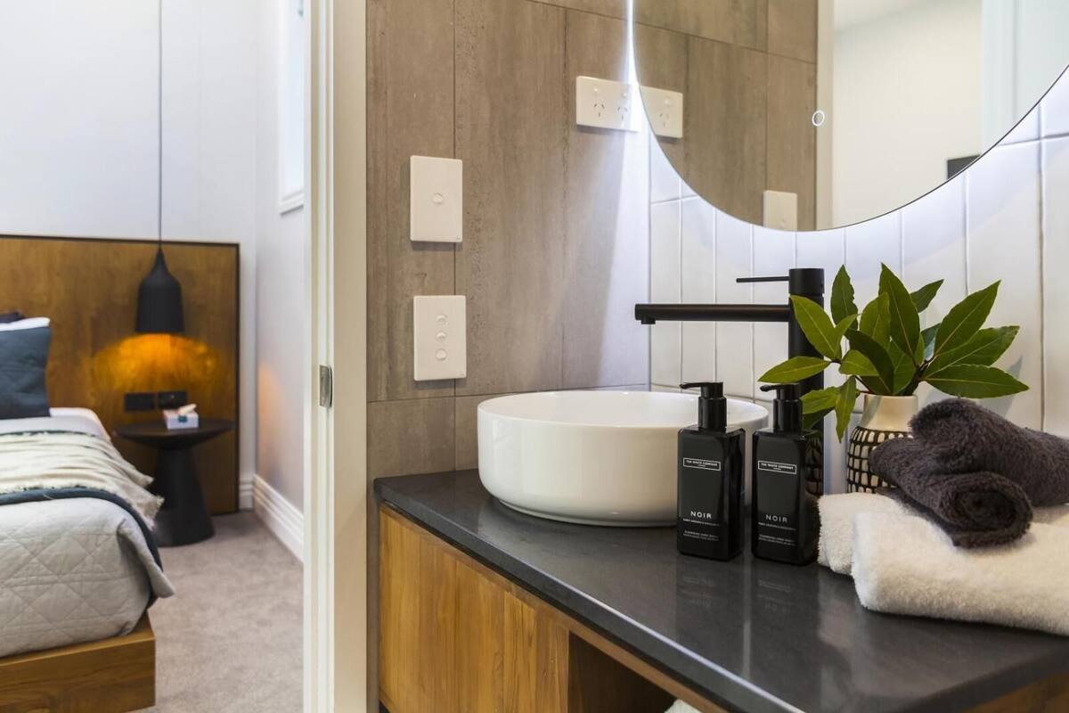 shower, hair dryer, dressing gowns, towels