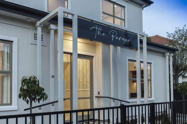 A building with a sign that reads "The Parque." - The Parque (Christchurch)