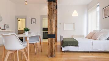 1 bedroom, desk, iron/ironing board, travel crib