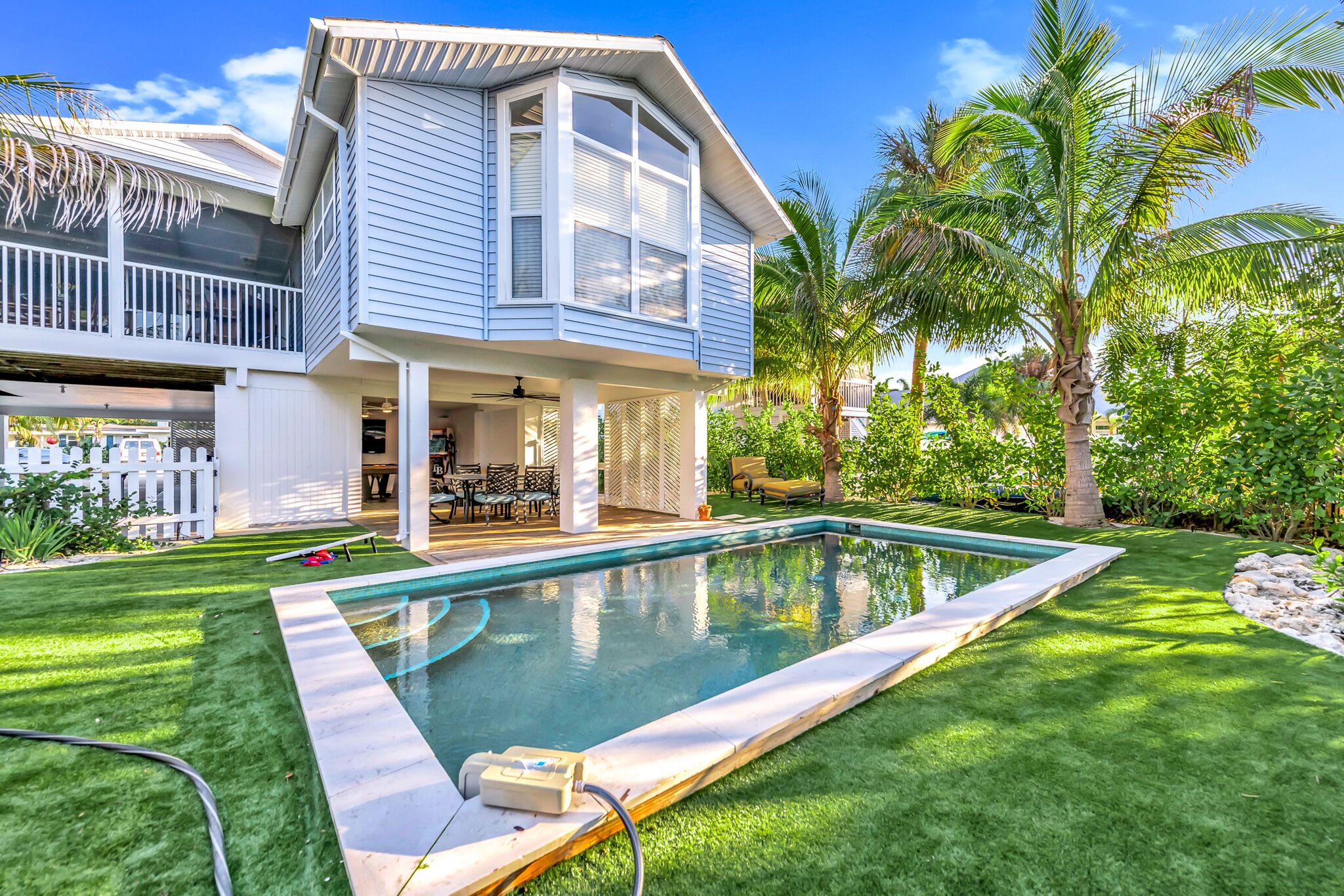 Canal front home with a pool and boat dock!