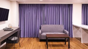 Familien-Suite | Wohnbereich | LED-Fernseher, Netflix, Fußbodenheizung, Streaming-Dienste