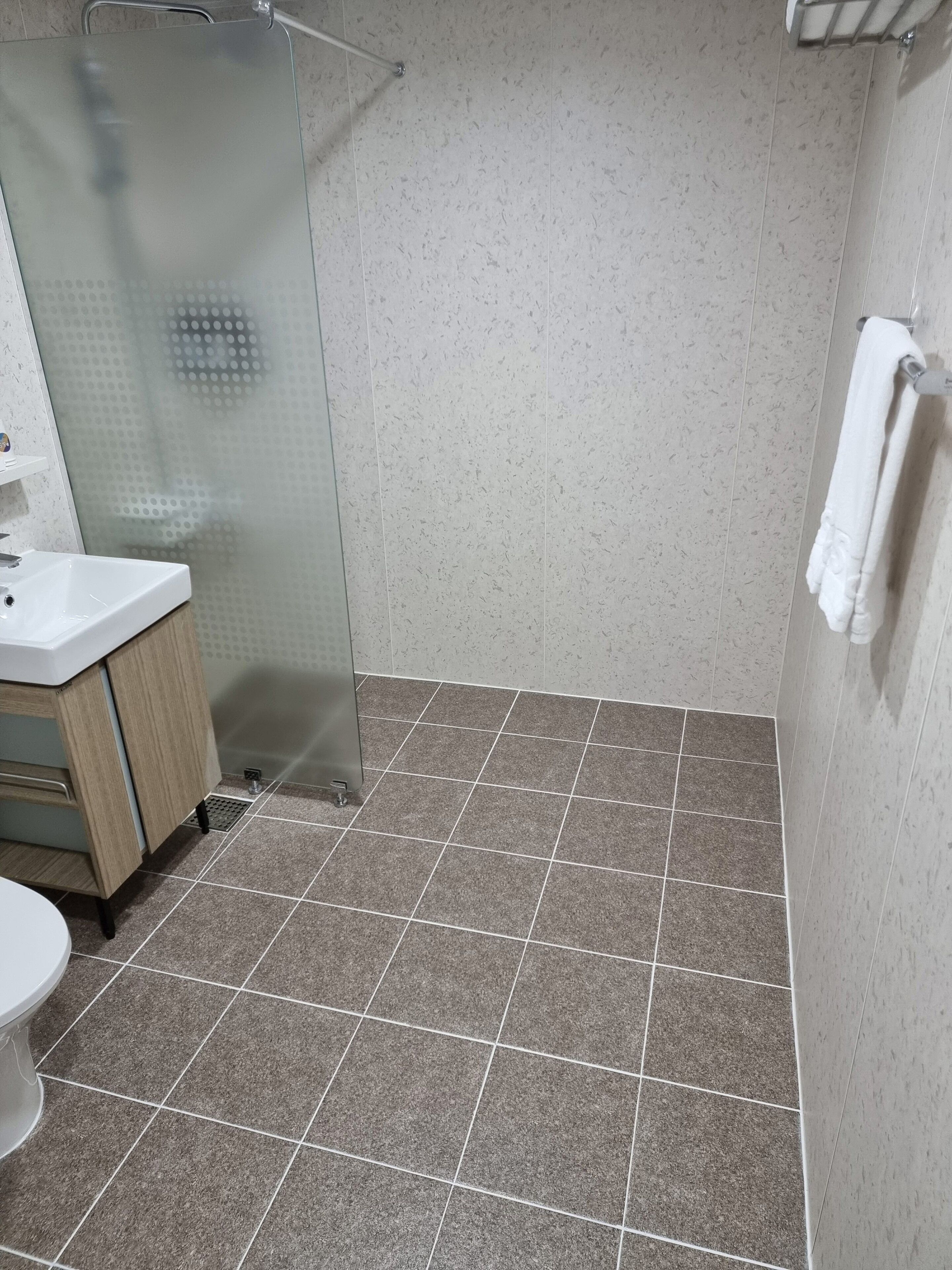 cinema room (no window) | bathroom | shower, free toiletries, hair dryer, bathrobes