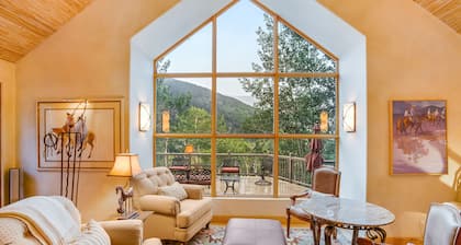 Elegant mountain escape with stunning view, spacious deck & fireplace
