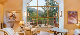 Elegant mountain escape with stunning view, spacious deck & fireplace