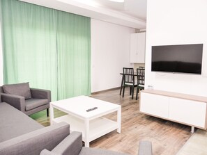 Comfort Apartment | Living area | Flat-screen TV - Clement Apartments (Piatra Neamt)