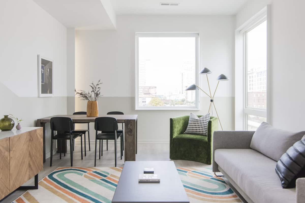Third-floor apartment, City View | Living area | 42-inch flat-screen TV with digital channels, TV, smart speakers