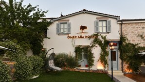 A building with a sign reading "ÖMER AGA KONAK". - Omer Aga Konagi (Ayvalik)