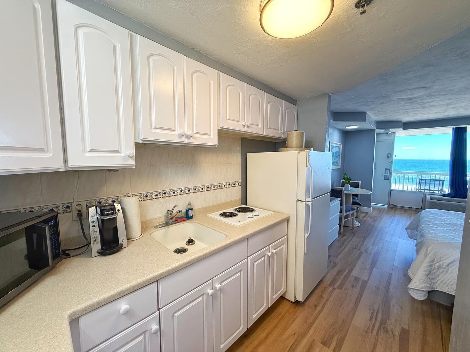 Romantic Studio, Kitchenette, Ocean View | Iron/ironing board, free WiFi, bed sheets
