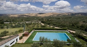 Seasonal outdoor pool, pool loungers