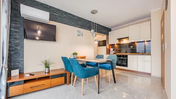 Apartment (116 A) | Wohnbereich | Flachbildfernseher