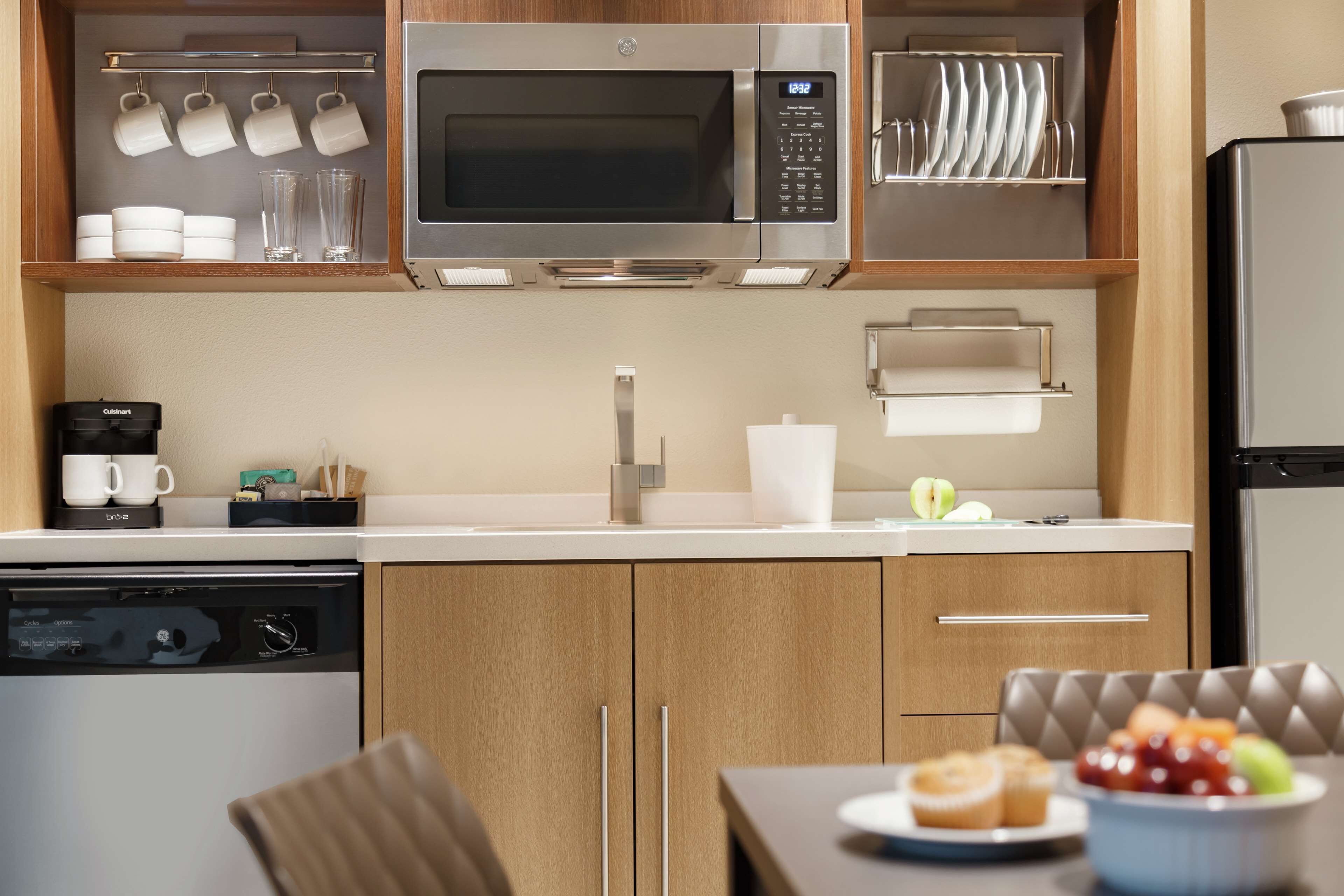 Microwave, coffee/tea maker, dining tables