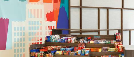 A snack display with various packaged foods.