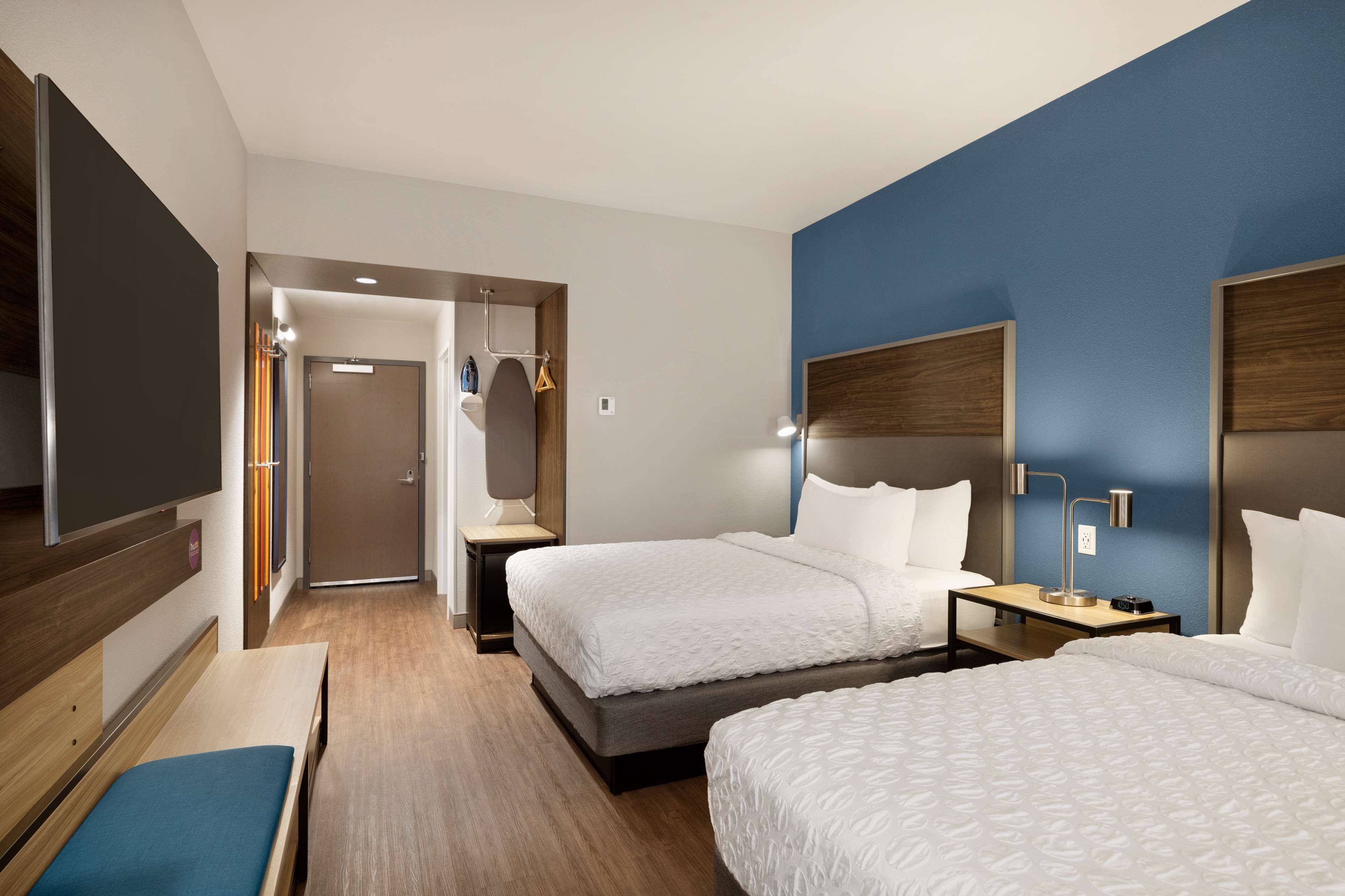 desk, laptop workspace, blackout curtains, iron/ironing board