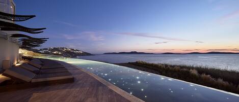 Indoor pool, an infinity pool, free cabanas, pool umbrellas