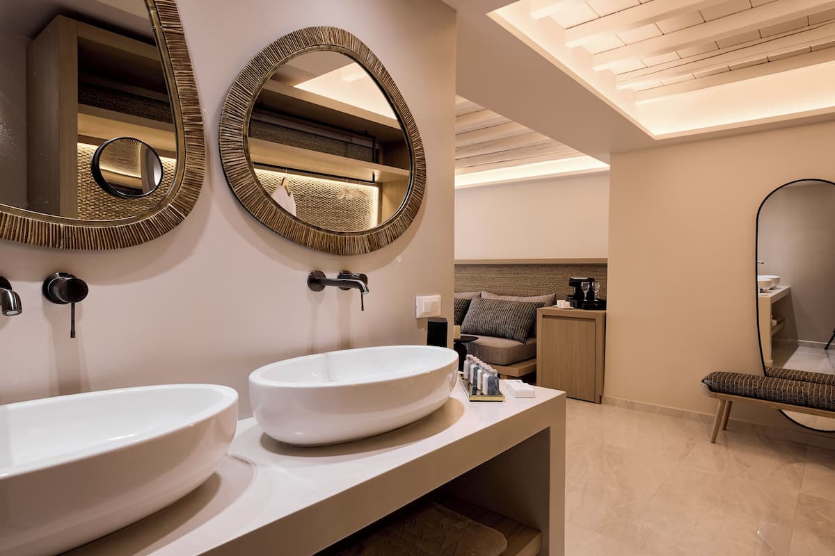 elegant suite with sharing pool (4 adults) | bathroom | free toiletries, hair dryer, bathrobes, slippers