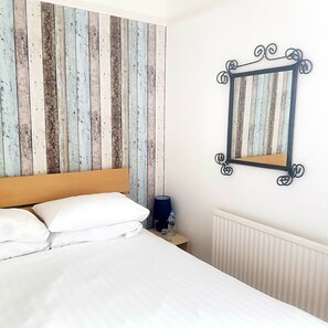 1 غرفة نوم ومكواة/لوح كي وواي فاي مجانًا وملاءات أسرّة