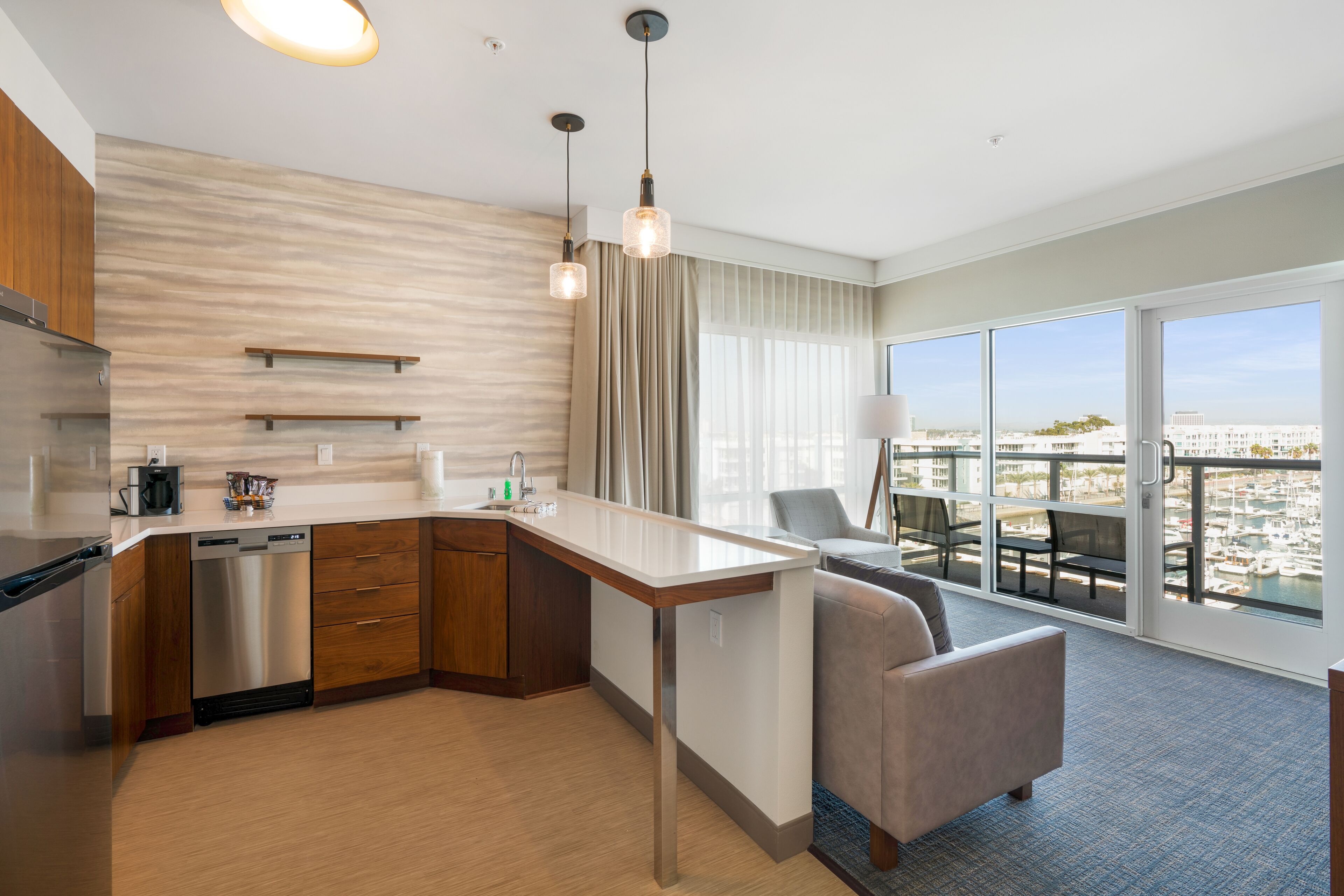signature suite, 1 bedroom, balcony | private kitchenette | mini-fridge, microwave, stovetop, dishwasher