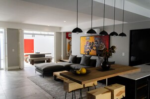 Luxury Apartment | Living area | Flat-screen TV, fireplace