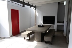 Luxury Apartment | Living area | Flat-screen TV, fireplace