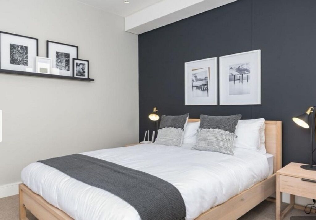 2 bedrooms, blackout curtains, iron/ironing board, free WiFi